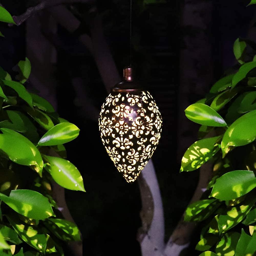 Solar outdoor light next to leaves