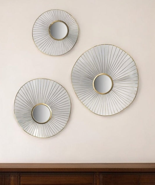 three circular mirrors