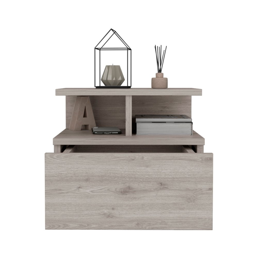 Grey floating bedside table with decoration
