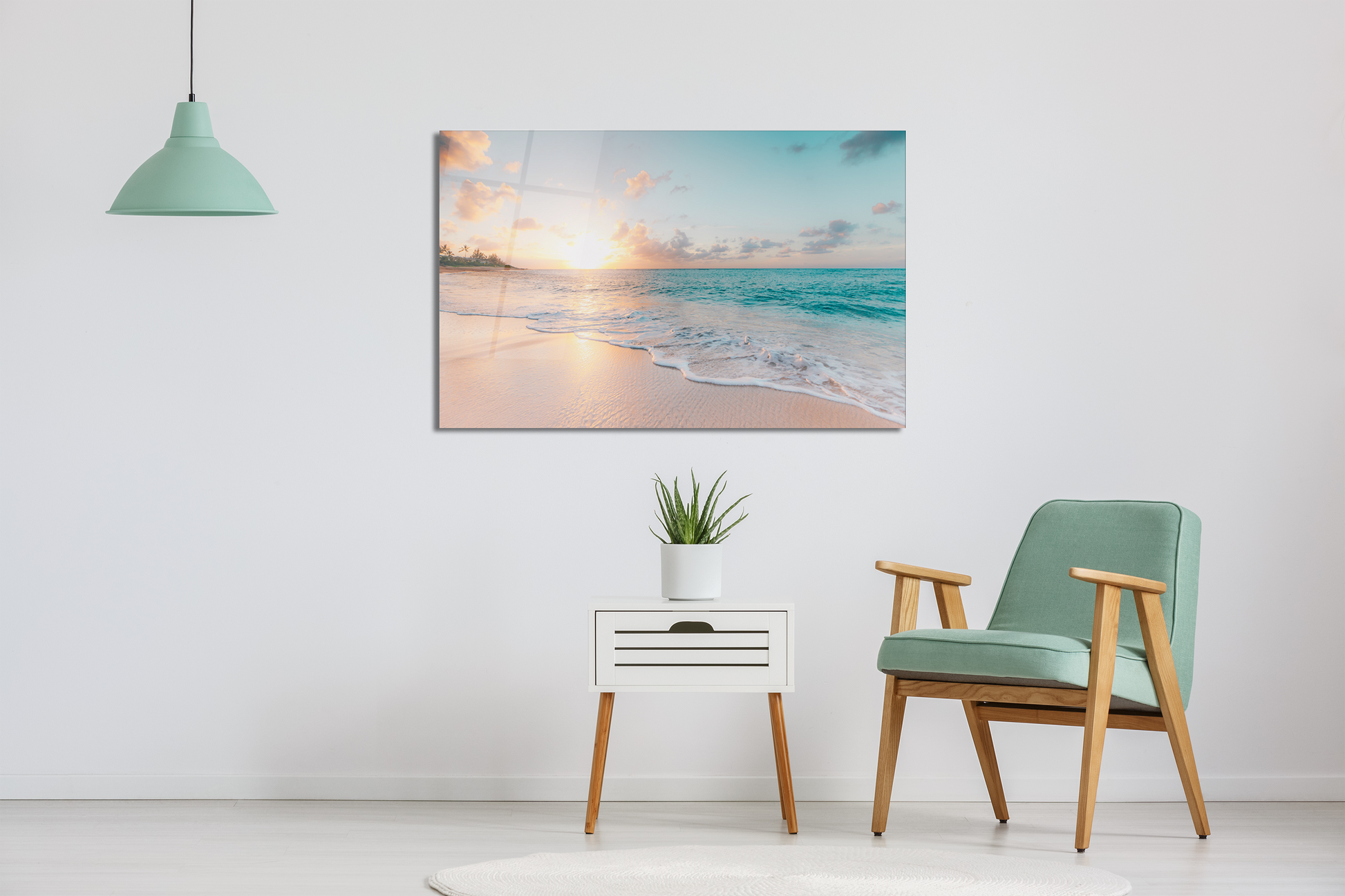 Beach wall art over a side table with a plant pot, a blue chair and a blue lamp