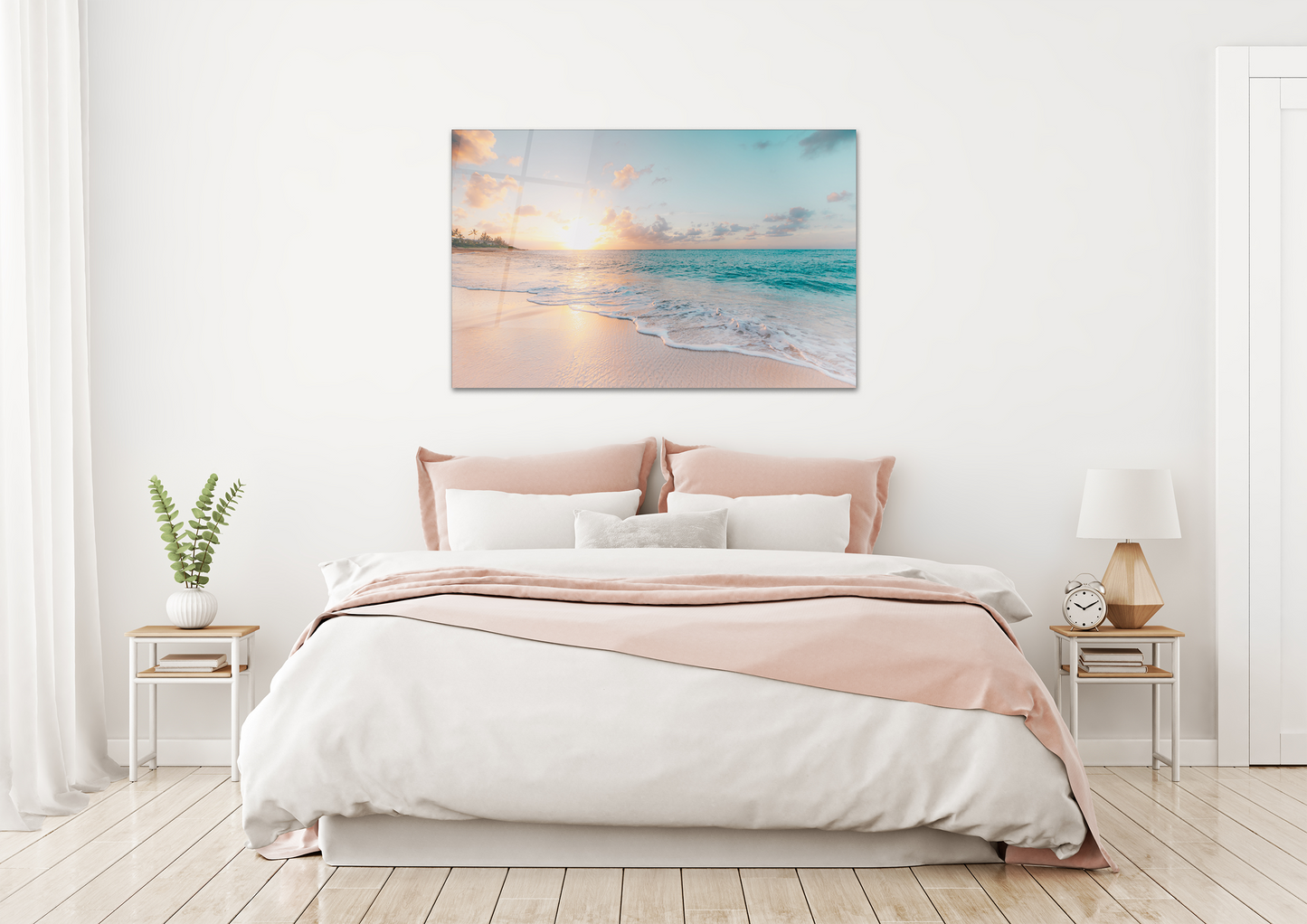 Beach wall art over a bed and two bed side tables